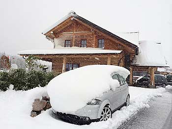 [写真]車に積もった雪